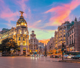 Madrid city skyline gran via street twilight , Spain