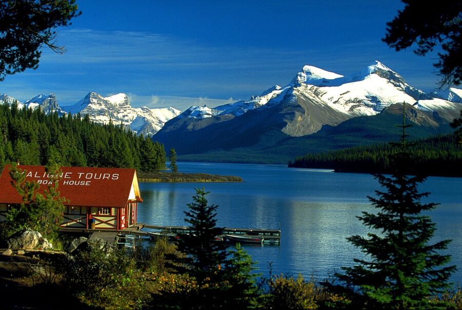 Quaint red building located at Maligne Lake, Jasper National Park, Canada, with scenic views of the surrounding landscape.