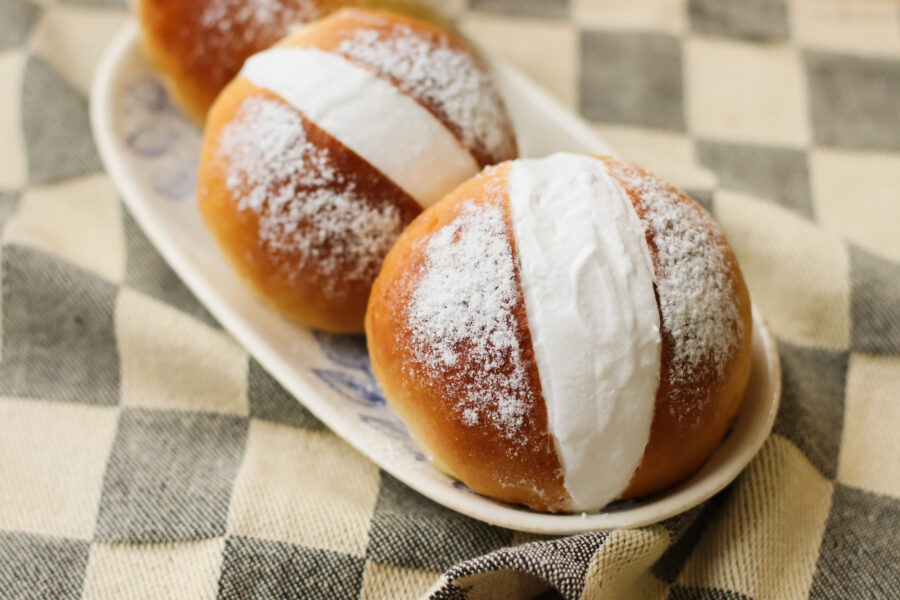 Close-up of sweet maritozzi romani buns, showcasing their soft texture and appetizing appearance
