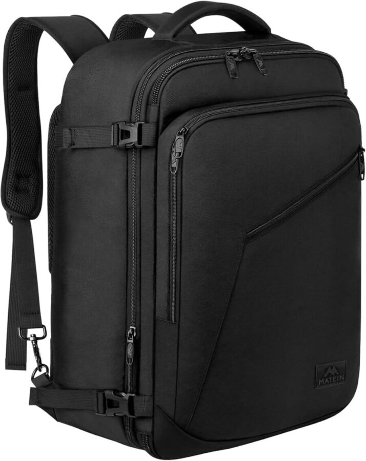 MATEIN black carry-on travel backpack with laptop sleeve and multiple zippered compartments.