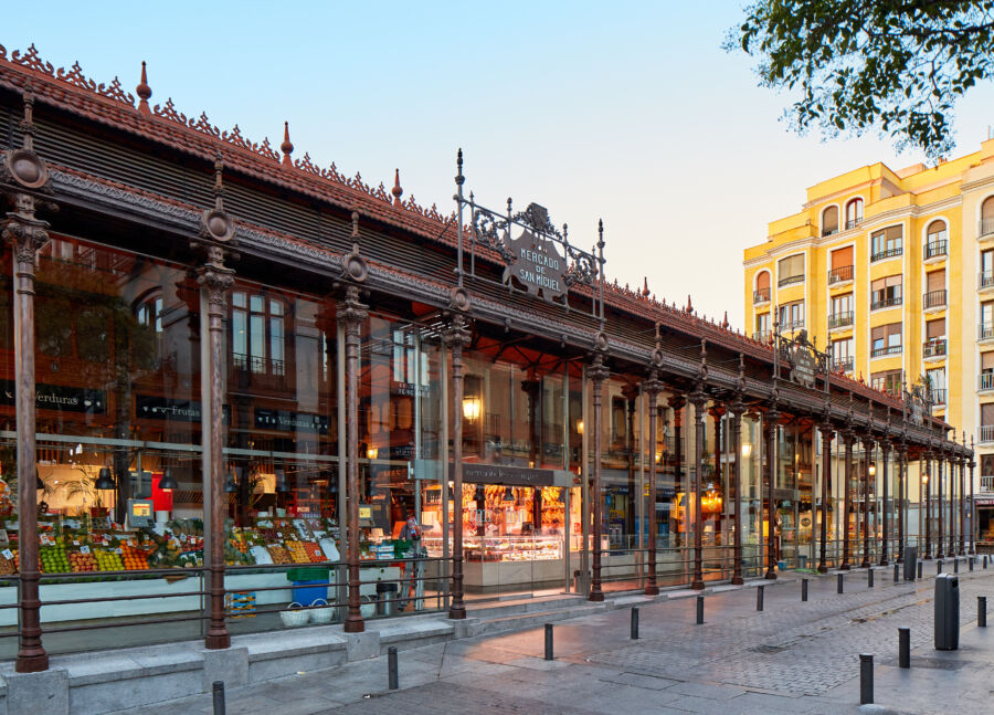 Exterior view of Mercado de San Miguel in Madrid, showcasing its vibrant architecture and bustling atmosphere