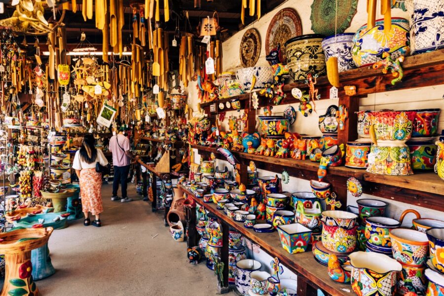 Vibrant display of colorful traditional Mexican souvenirs at a market in Mexico City