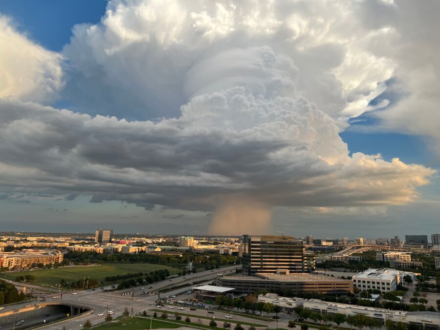 Visual representation of a microburst, emphasizing the localized, powerful winds produced by sinking air in a thunderstorm