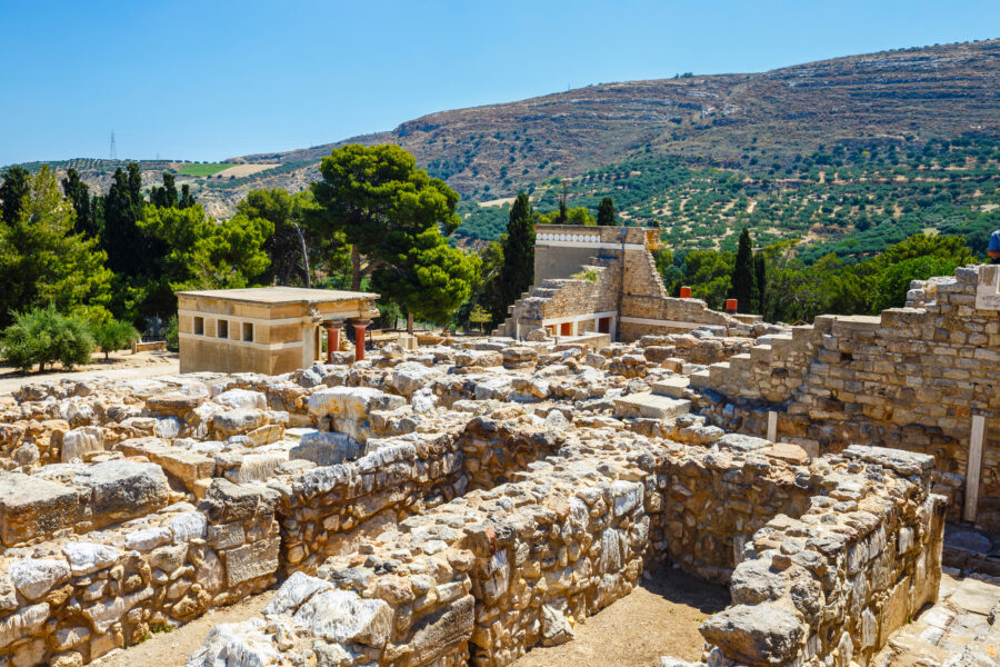 Scenic view of the ancient ruins of the Minoan Palace of Knossos, showcasing its historical architecture on Crete, Greece.