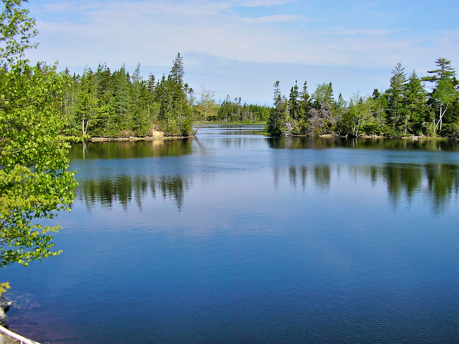 Mira River at Albert Bridge, Cape Breton — tree-lined islands and calm water.