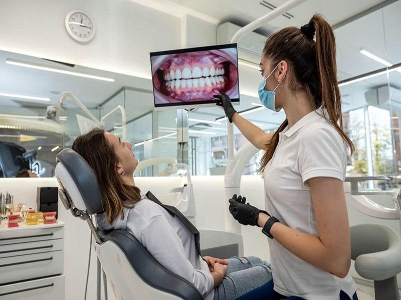 Modern dental clinic with patient consultation, highlighting advanced care and technology in Turkey.