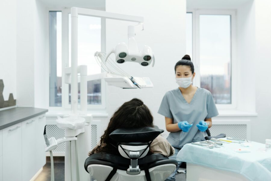 Modern dental clinic with bright ambiance, patient comfort, natural light, and organized tools.
