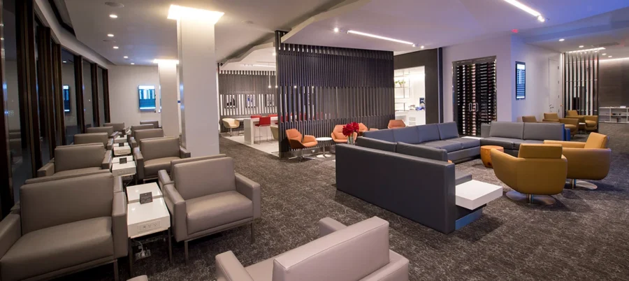 Modern lounge area with sleek design, diverse seating, and sophisticated ambiance.