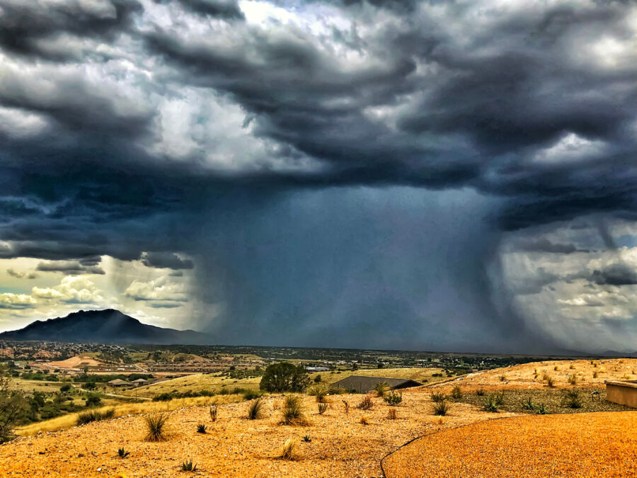 Dramatic scene featuring dark clouds indicative of a monsoon microburst