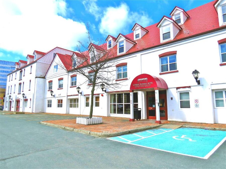 Murray Premises Hotel building exterior in St. John, Canada, showcasing its historic architecture and inviting entrance