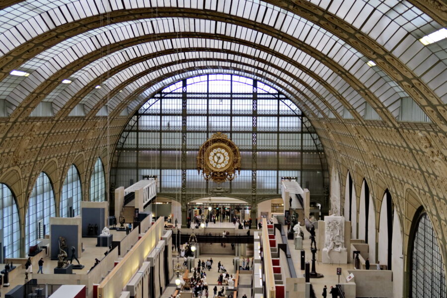Aerial view of the Musée d’Orsay, interior, showcasing its elegant architecture and art exhibits.