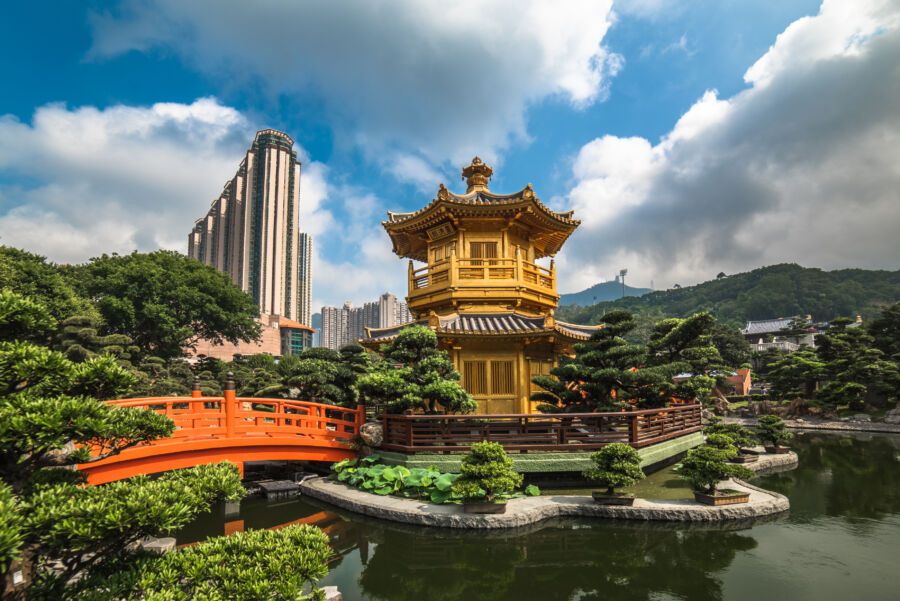 The golden pavilion in Nan Lian Garden, Hong Kong, stands elegantly amidst vibrant greenery and serene landscapes