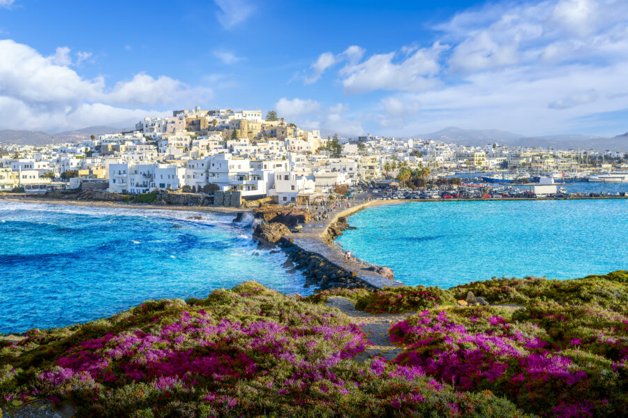 Scenic panorama of Naxos Chora town, featuring traditional architecture and coastal views on Naxos island, Greece.