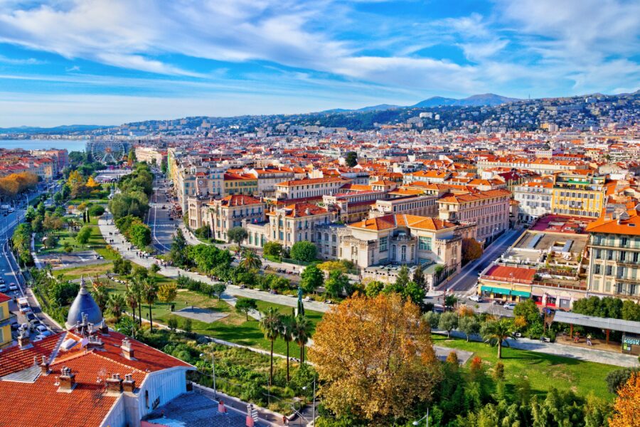 Aerial view of Nice, France, showcasing the vibrant old town, Massena Square, and Promenade du Paillon from Saint Francis Tower