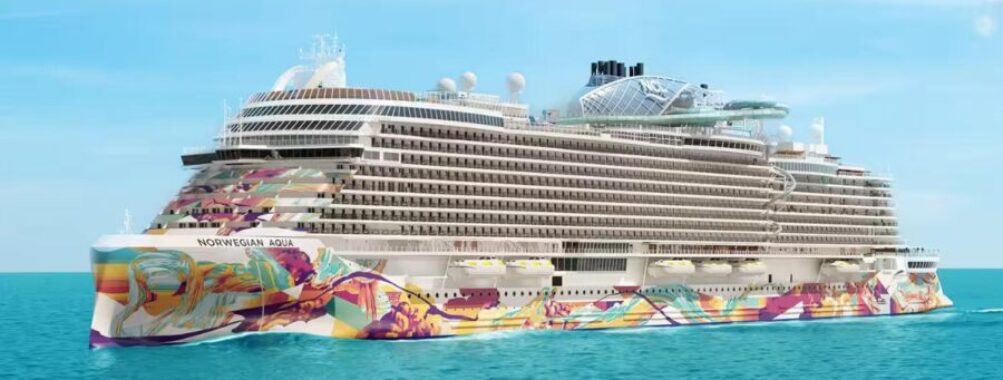 Vibrant Norwegian Aqua cruise ship with colorful hull against serene sea and blue sky.