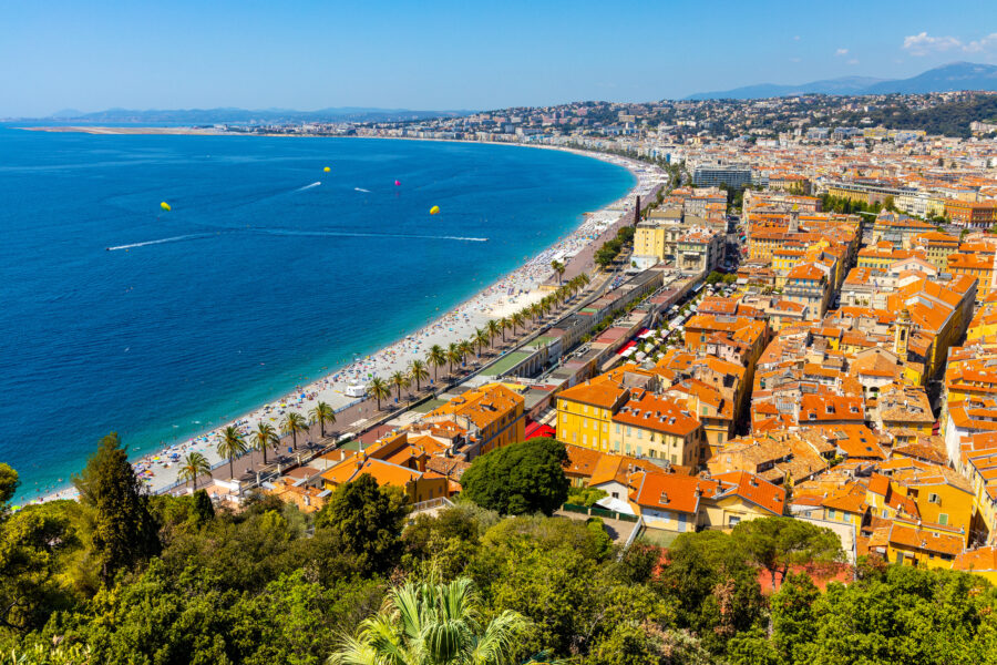 Panoramic view of Vieille Ville, Promenade des Anglais, and the beach along the Mediterranean coast in France