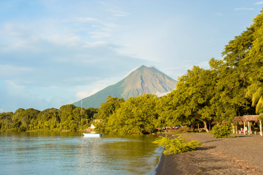 Volcano Concepcion rises majestically on Ometepe Island, surrounded by lush greenery and a serene lake
