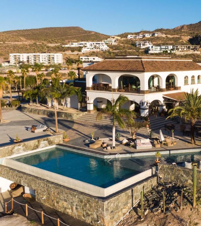 Orchid House Baja in La Paz, Baja California Sur, with a refreshing pool set against a backdrop of tropical plants.