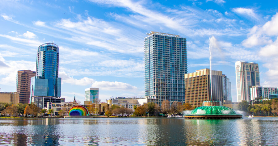 Orlando, Florida skyline featuring modern buildings and a clear blue sky, showcasing the city's vibrant urban landscape.