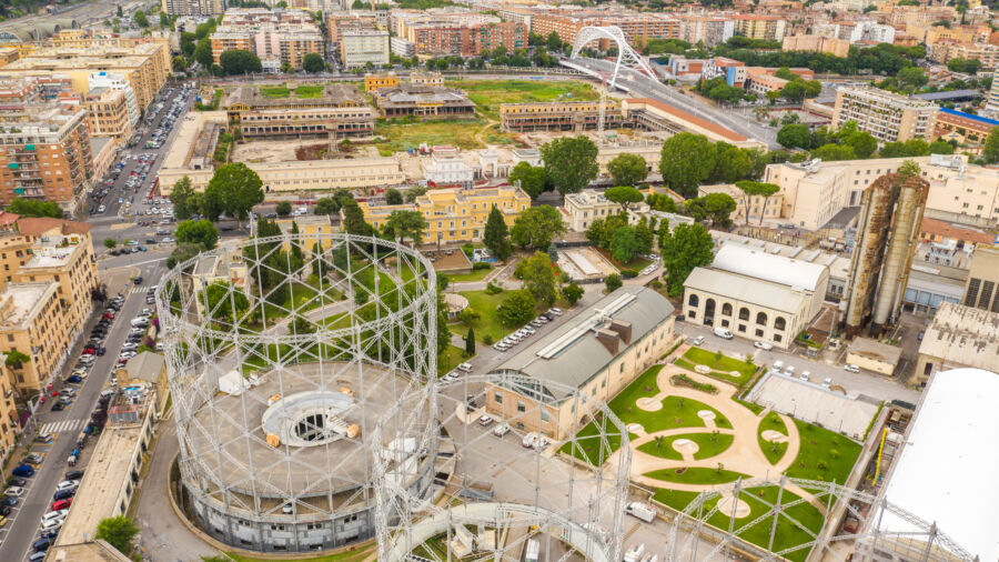 Aerial view of the abandoned Gasometer in Rome's Ostiense district, showcasing its industrial structure