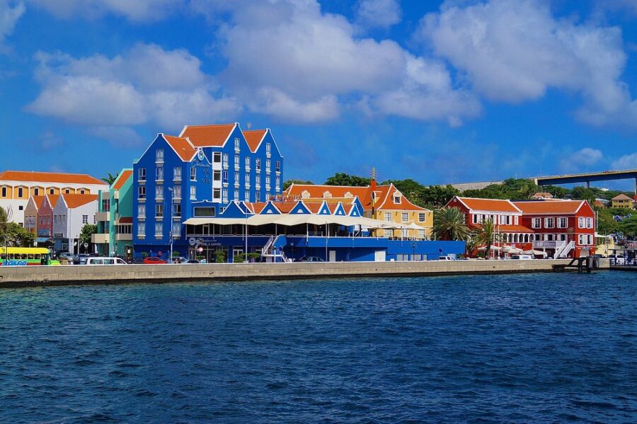 Bright blue sky dotted with clouds, viewed from Otrobanda, Willemstad, Curacao.
