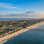 Aerial view of the Outer Banks in North Carolina, showcasing sandy beaches and coastal landscapes.