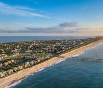 Aerial view of the Outer Banks in North Carolina, showcasing sandy beaches and coastal landscapes.