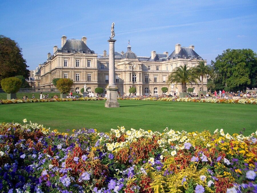 Luxembourg Gardens Paris: vibrant flowers, Luxembourg Palace architecture, serene oasis, historic European charm.
