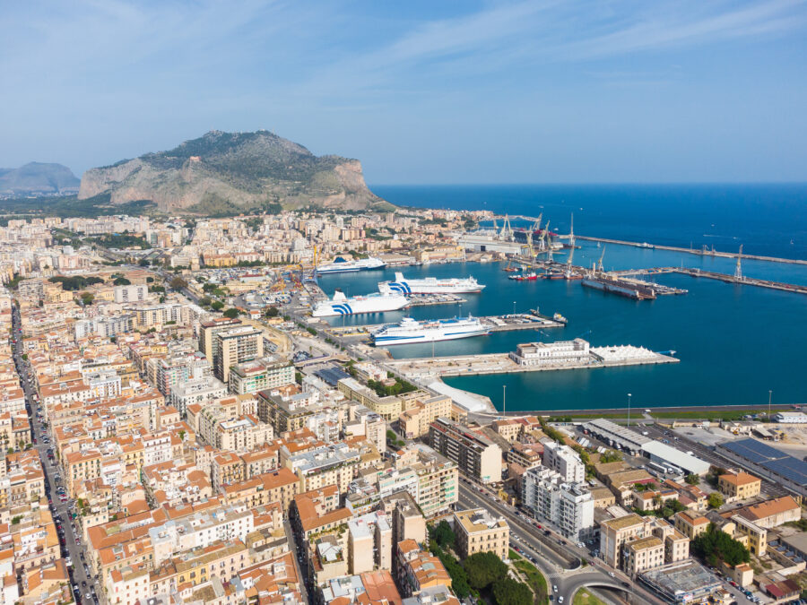 Aerial view of ferry boats anchored in Palermo harbor, the largest city in Sicily by the Mediterranean Sea