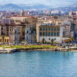 Scenic view of Palermo's seafront, showcasing the coastline and vibrant city life in Sicily, Italy.