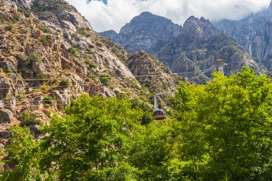 Palm Springs Aerial Tramway ascending towards Mt. San Jacinto, highlighting the natural beauty of California's state park.
