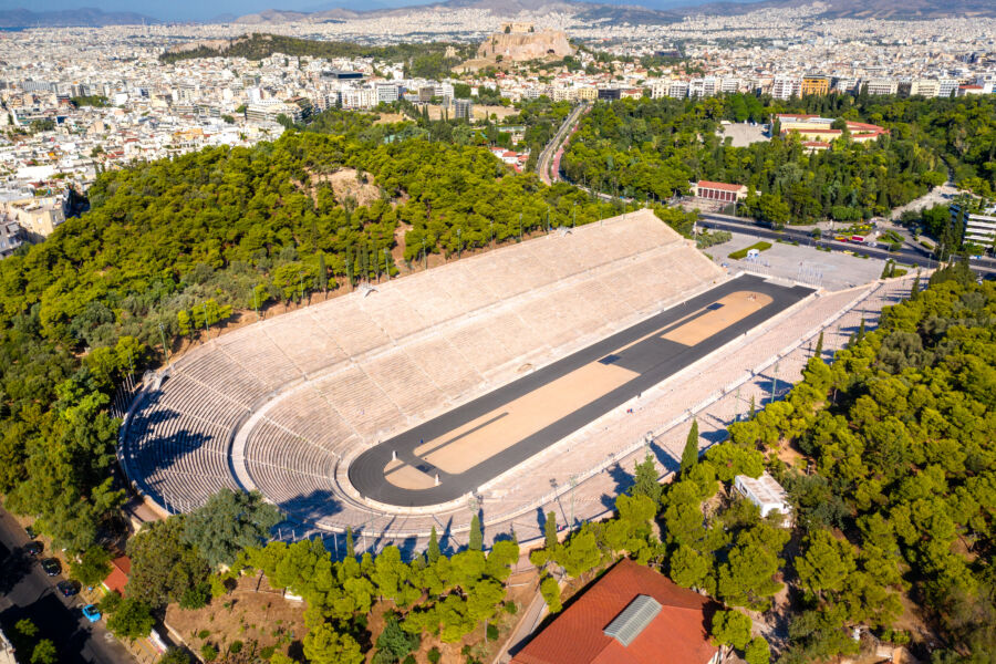 Panathenaic Stadium in Athens, Greece, showcasing its ancient marble structure and seating arrangement for spectators.
