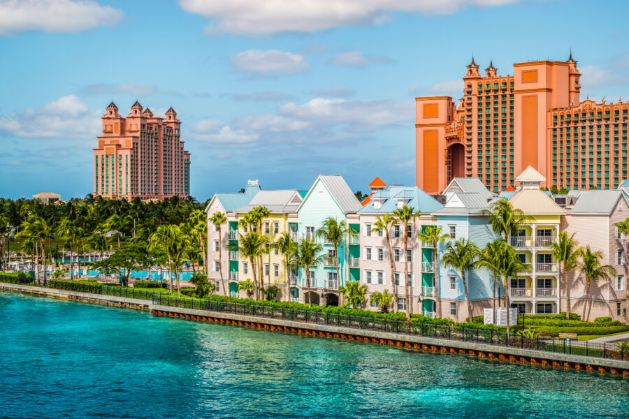 Colorful buildings line the waterfront at the ferry terminal on Paradise Island, Nassau, Bahamas