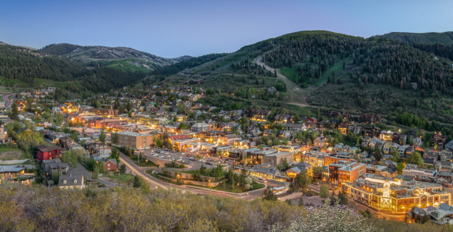 Park City, Utah, city skyline at night, featuring glowing lights and a serene atmosphere