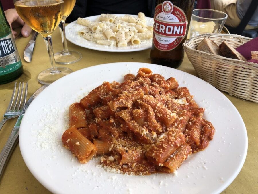Amatriciana rigatoni with tomato sauce and grated cheese, bread and Peroni beer.