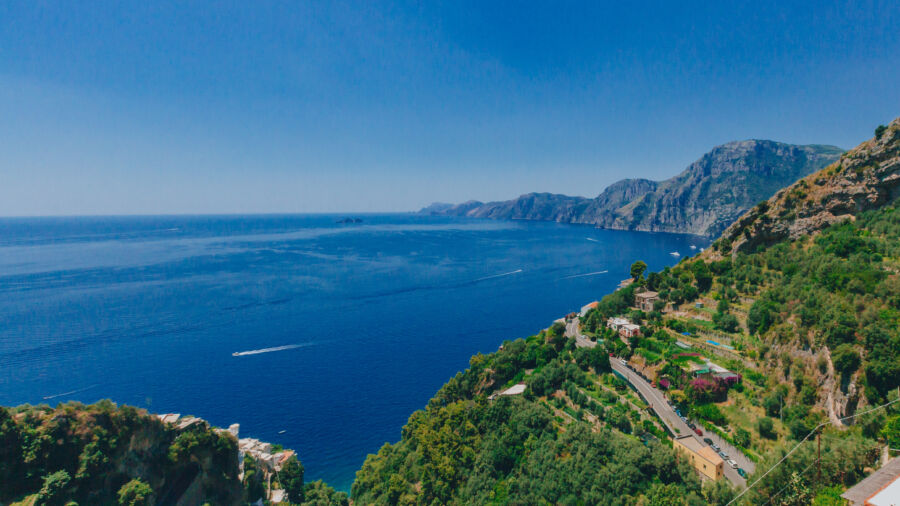 Scenic view of the Amalfi Coast's mountains and coastline from the Path of the Gods hiking trail near Positano, Italy.
