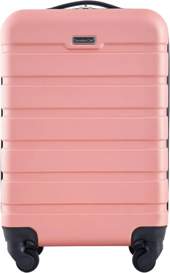 Travelers Club peach-pink hard-shell carry-on suitcase with spinner wheels.