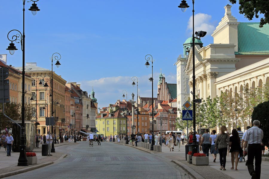 People Walking on the Street of Warsaw on a good weather