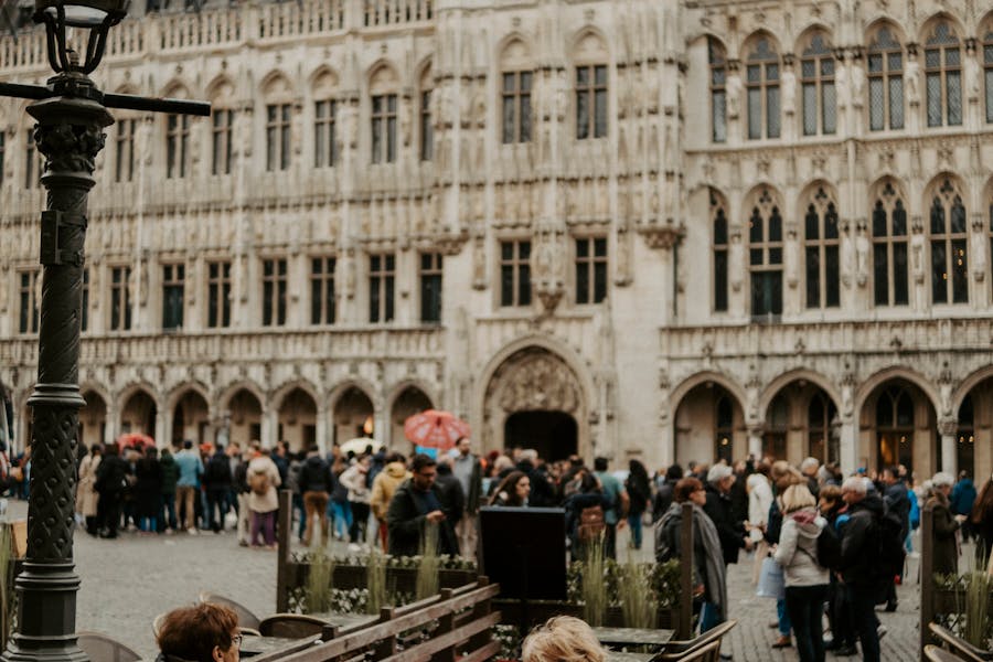 Women Sitting by a Table Near the Town Hall in Brussels, Belgium