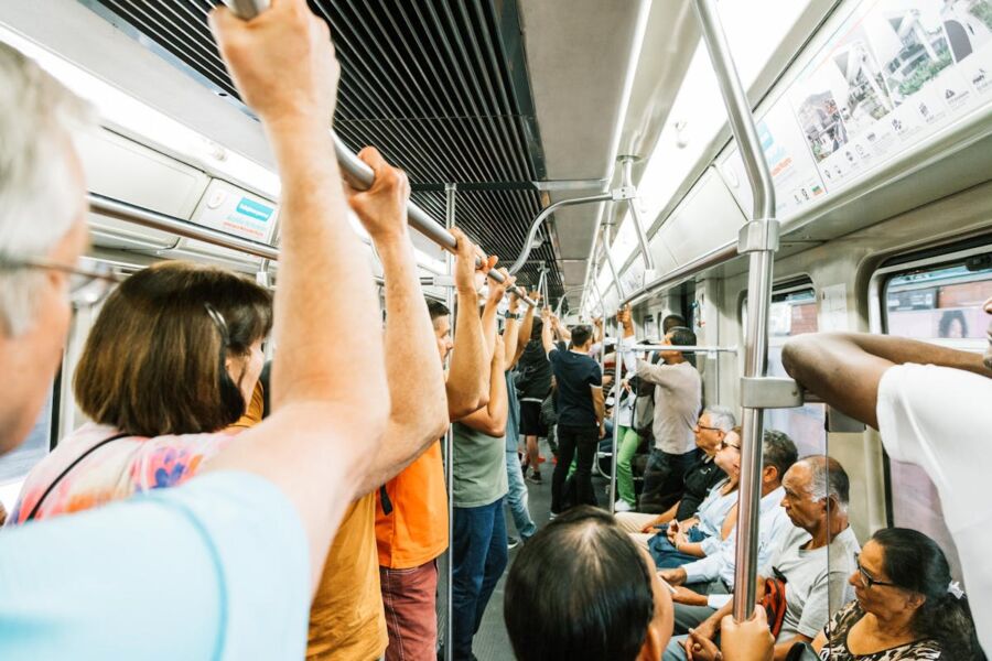 Metro train full of people during busy day