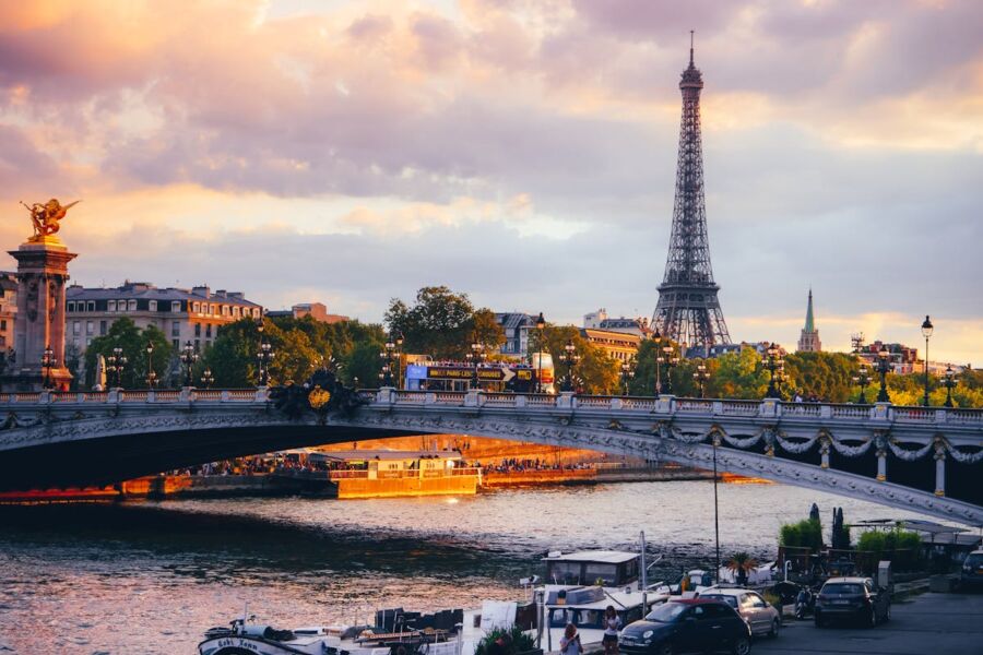 View of a bridge in Paris at sunset