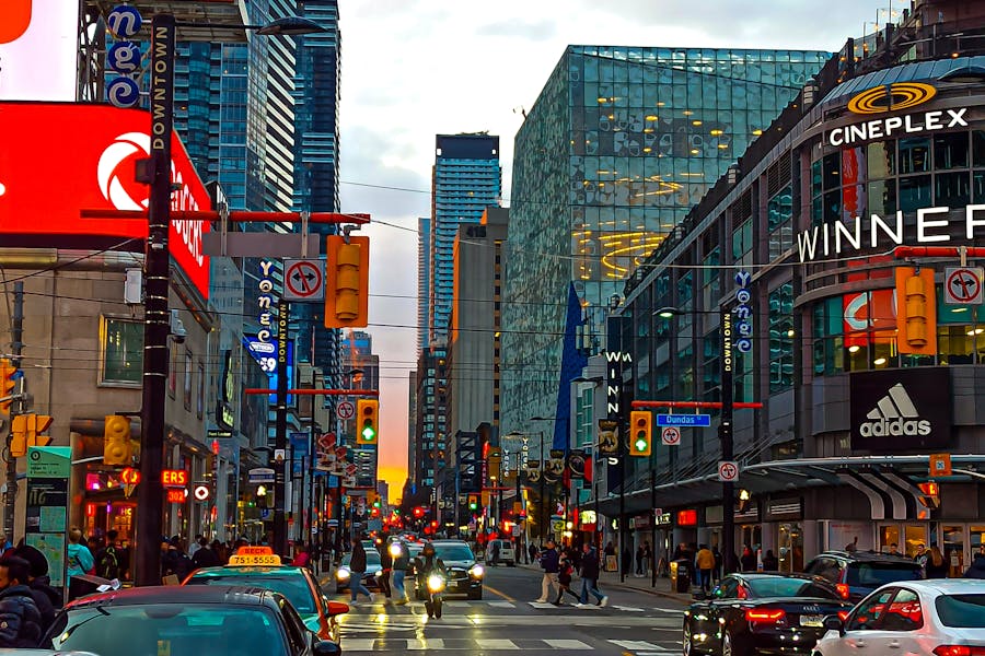 View of a Busy Street between Skyscrapers Downtown Toronto, Ontario, Canada 