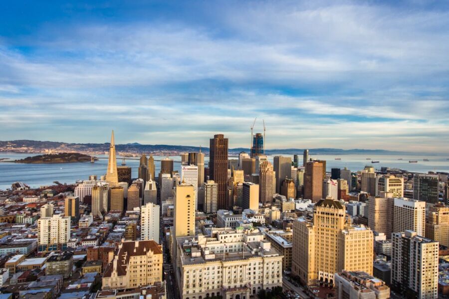 High Angle View of Cityscape Against Cloudy Sky