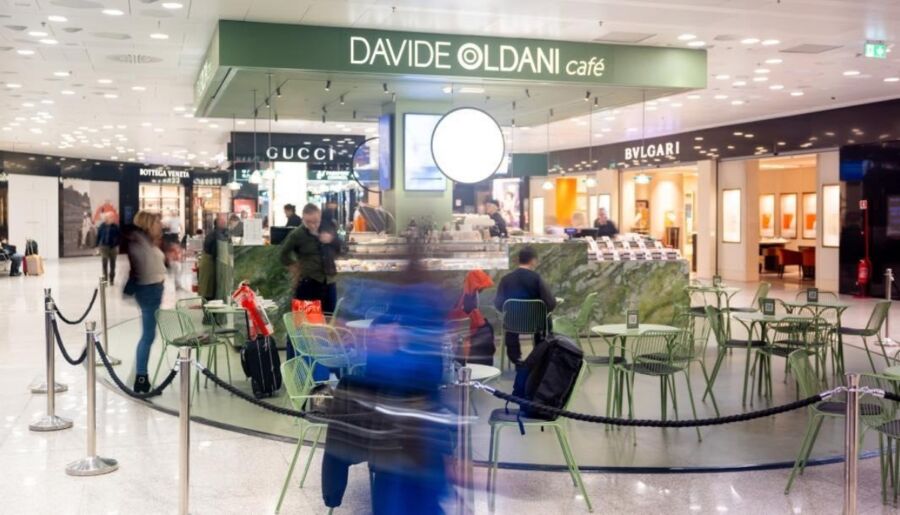 Exterior view of David O'Hara's new store in Piazza del Lusso at Milan Malpensa, featuring contemporary architecture and an inviting entrance.
