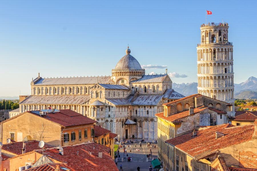 Aerial view of the Cathedral and Leaning Tower of Pisa, captured from the Grand Hotel Duomo, showcasing Tuscan architecture