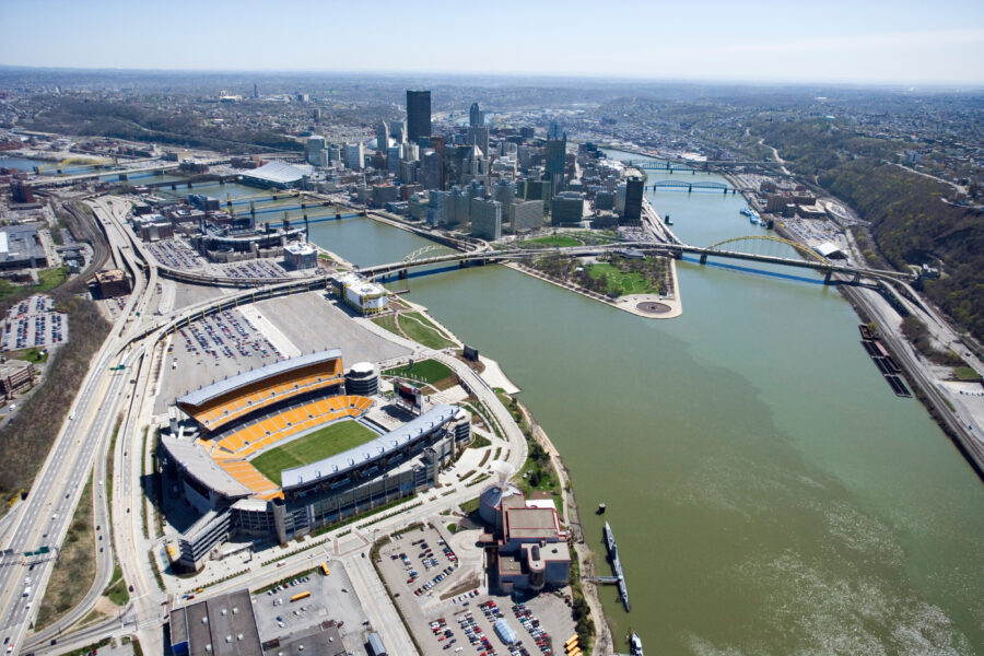 Panoramic view of Pittsburgh's stadium, showcasing its modern architecture and vibrant atmosphere during a game day