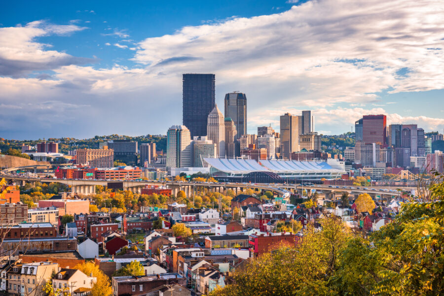 Aerial view of Pittsburgh, Pennsylvania, showcasing the city skyline with its iconic buildings and rivers.