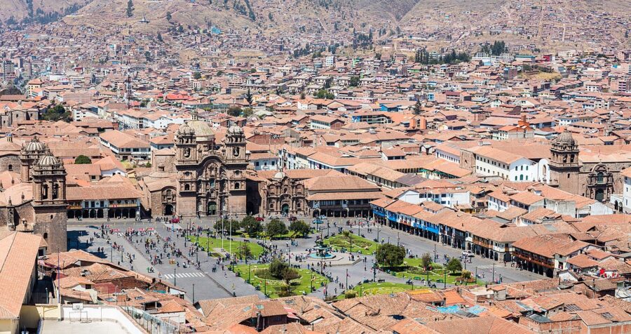 Aerial view of Plaza de Armas in Cusco, Peru, showcasing the historic architecture and vibrant city life.