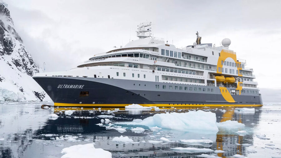 Luxury Antarctica expedition cruise ship Ultramarine sailing through icy polar waters and glaciers.