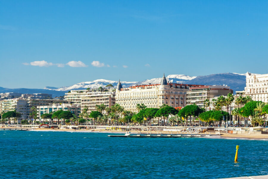 Scenic panorama of Promenade de la Croisette, featuring the vibrant coastline and Port Le Vieux in Cannes, France